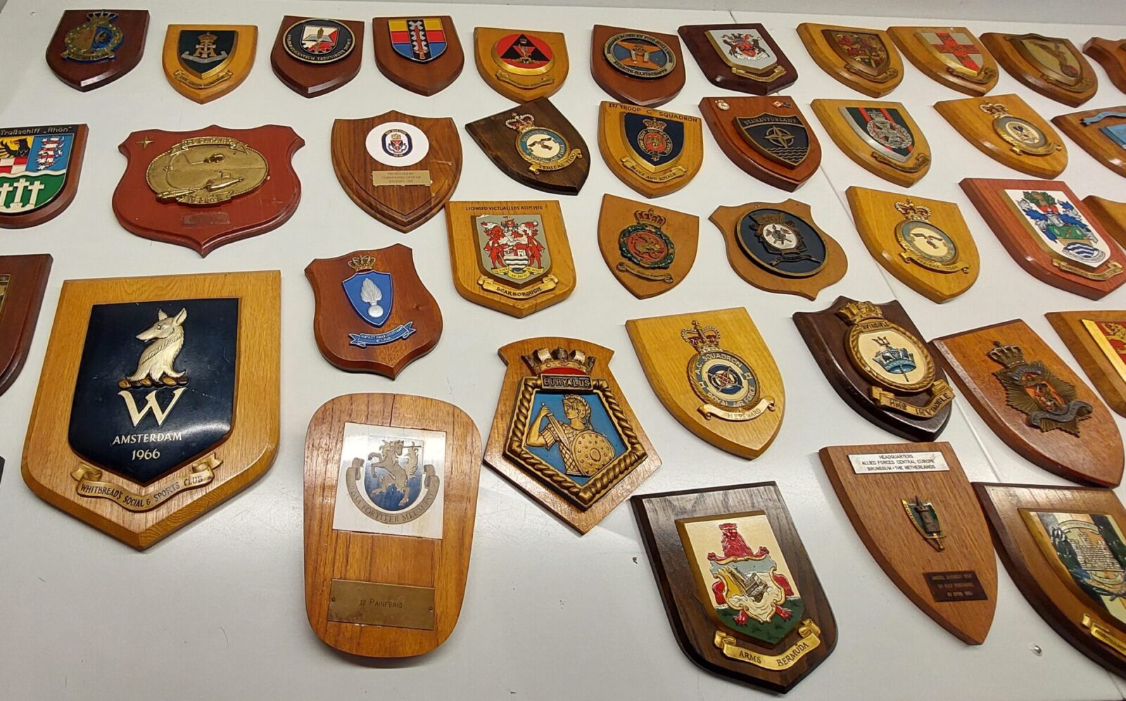 A picture showing a selection of little coats of arms.